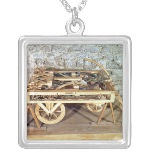Model of a car driven by springs silver plated necklace