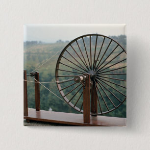 Model of a spinning machine button