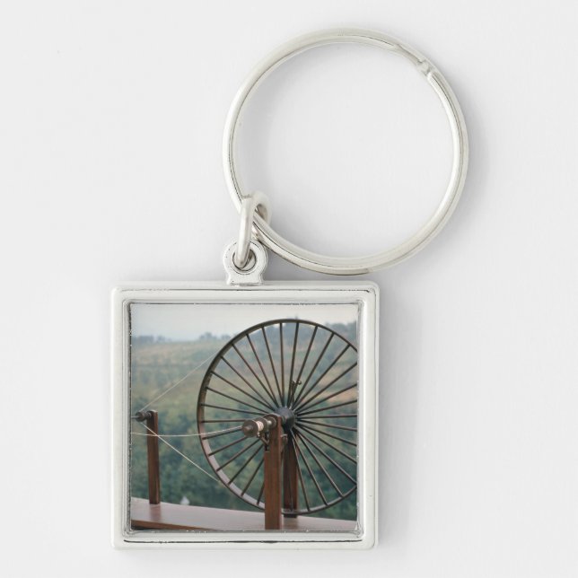 Model of a spinning machine keychain (Front)