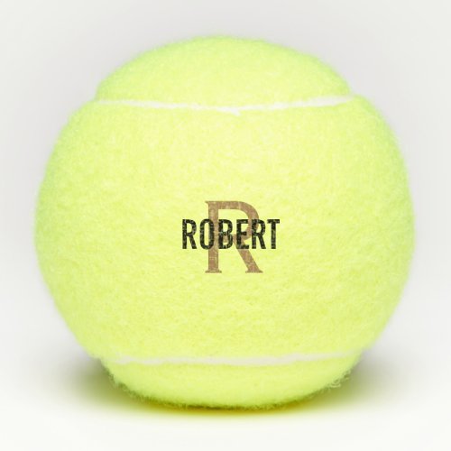 Moder black gold monogrammed  tennis balls