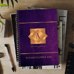 Modern 2026 gold monogram name script elegant planner<br><div class="desc">A classy elegant business or personal 2026 purple planner featuring gold copper metallic geometric monogrammed square label on a leather look background. Perfect for a stylish business image for a business corporate manager, director, fashion stylist, home interior decorator, designer, architect, beauty salon manager, makeup artist, hairstylist. Easy to personalize with...</div>