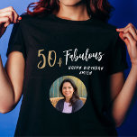 Modern 50 and Fabulous Photo 50th Birthday Black T-Shirt<br><div class="desc">Modern 50 and Fabulous Photo 50th Birthday Guest of honor black woman t-shirt. Modern and simple design with trendy script 50 & Fabulous. Custom photo birthday t-shirt for her. Customize with the name and age and add your photo into the template.</div>