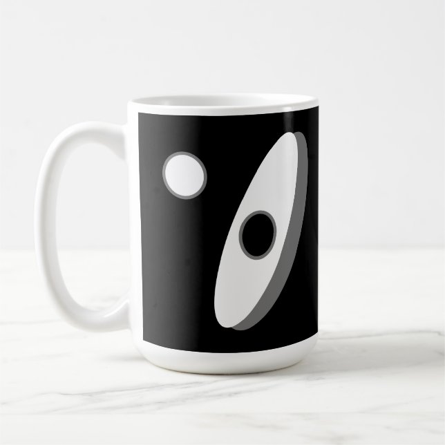 Modern abstract shapes on black and white coffee mug (Left)
