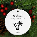 Modern and Elegant Family Name Tropical Vacation Ceramic Ornament<br><div class="desc">Remember your family's tropical vacation with this personalized Christmas ornament. The ornament is modern and elegant and has a black silhouette of a palm tree and black text for your family's name, vacation year, and trip destination. This ornament is a lovely keepsake that will be treasured for years to come....</div>
