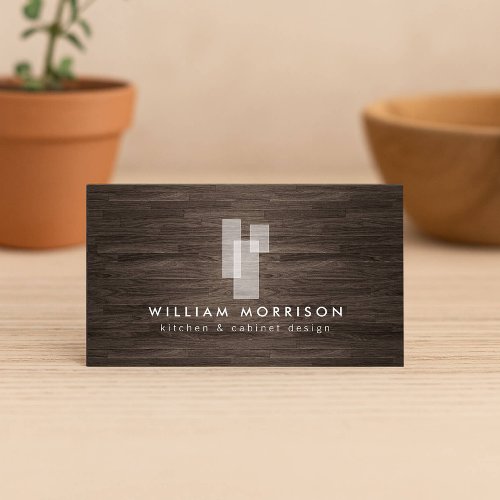Modern Architectural Logo on Dark Woodgrain Business Cards