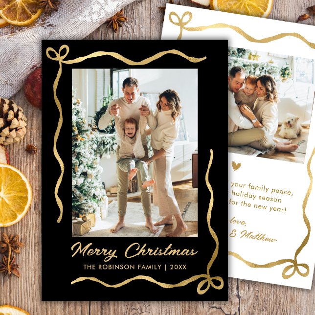 Modern Black and Gold Bow 2 Photo Merry Christmas Holiday Card (Creator Uploaded)