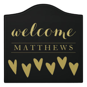 Modern black and gold door sign