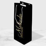 Modern Black and Gold Personalized Bridesmaids Wine Gift Bag<br><div class="desc">Modern Black and Gold Personalized Bridesmaids Gifts featuring personalized bridesmaid's name in gold modern script font style with title and wedding date in modern sans serif font style on black background. Also perfect for Maid of Honor, Flower Girl, Mother of the Bride and more. Please Note: The foil details are...</div>