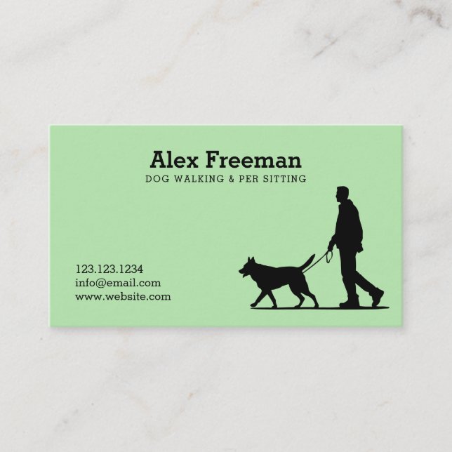Modern Black and Green Dog Walker Silhouette Business Card (Front)