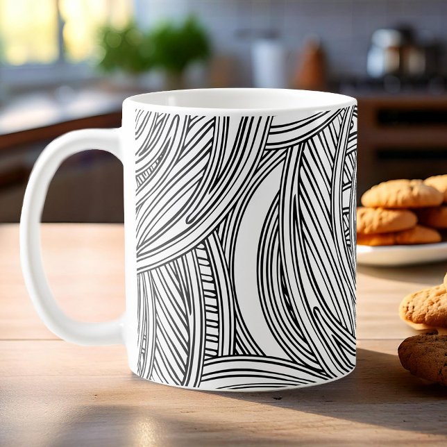 Modern black and white coffee mug with swirls. (Creator Uploaded)