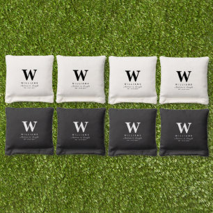 Modern Black And White Minimalist Family Name Cornhole Bags
