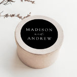 Modern Black and White Personalized Wedding Classic Round Sticker<br><div class="desc">Seal your invitation envelopes or favors with our elegant wedding stickers. The custom wedding stickers feature your names in a white calligraphy script with a black background or color of your choice. Design coordinates with our Modern Elegance wedding collection.</div>