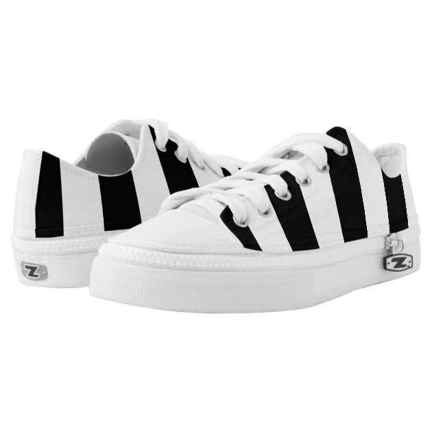 black sneakers with white stripes