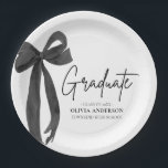 Modern Black Bow Coquette Graduate Graduation Paper Plates<br><div class="desc">Serve up style with our Modern Black Bow Coquette Graduate Graduation Paper Plates 🎓🖤 Featuring a sleek black bow and elegant minimalist design, these plates are perfect for adding a chic touch to your grad party table. Durable, cute, and totally on theme ✨🍽 Pair them with matching napkins and cups...</div>