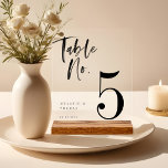 Modern Black Brush Script Wedding Table Number Acrylic Sign<br><div class="desc">Celebrate love and elegance with our minimal & modern brush script style wedding table number acrylic sign! Personalize it effortlessly with your names, wedding date, and table number for a truly bespoke touch. The sleek black brush script and font style design add a touch of sophistication to your reception decor....</div>