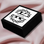 Modern Black Floral Wreath Split Monogram "K" Gift Box<br><div class="desc">This refined floral split monogram wreath design features a delicate botanical arrangement forming a graceful circular frame around a customizable monogram "K" and name. The balanced composition highlights elegant leaves and floral accents that create a timeless and sophisticated look. This jewelry keepsake box is perfect for personalized gifts, wedding favors,...</div>
