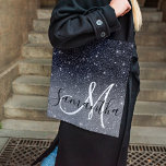 Modern Black Glitter Sparkles Personalized Name Tote Bag<br><div class="desc">Introducing our stunning Modern Black Glitter Sparkles Personalized Name product, available exclusively on Zazzle! Add a touch of elegance and sparkle to your everyday life with this custom-made item. Our Modern Black Glitter Sparkles Personalized Name product features a sleek black background adorned with mesmerizing glittery sparkles. The combination of black...</div>