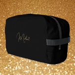 Modern Black Gold Monogram Mens Womens Gym Travel Dopp Kit<br><div class="desc">Create your own custom, personalized, beautiful modern elegant faux gold script / typography monogram monogrammed, durable Polyester Poplin, sturdy polyester fabric mens womens kids solid plain black cosmetic makeup toiletry organizer golf beach accessory gym travel dopp kit bag pouch with a zippered closure, two interior mesh pockets - one zippered...</div>