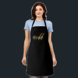 Modern Black Gold Monogram Script Apron<br><div class="desc">An elegant monogrammed apron with gold script with unique bold flourish,  and white serif name on a rich black background. Modern trendy style.</div>