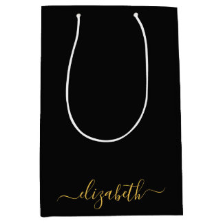 Modern black gold monogram script name medium gift bag