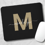Modern Black Gold Script Name Initial Monogram Mouse Pad<br><div class="desc">Personalized Elegant Modern Black Gold Script Initial Name Monogram Mouse Pad. Add a touch of sophistication to your workspace with this chic mouse pad. It features a flat gold-colored initial (without shimmer or foil) centered on a sleek black background. The refined design combines elegance with practicality, making it a perfect...</div>