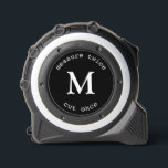 Modern Black Measure Twice Cut Once Monogram Tape Measure<br><div class="desc">Modern White "Measure Twice Cut Once" Quote Monogram design. A minimalist monogram design with a large serif typography initial in a classic font on a solid black background.</div>