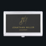 Modern Black Monogram Business Card Case<br><div class="desc">Keep your business cards organized and stylish with this modern black business card case. The design features a golden monogram, name and title, adding a personal touch to your professional look. This case is perfect for carrying in your bag or briefcase, and makes a great gift for colleagues and clients....</div>