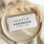 Modern Black Monogram Mr and Mrs Hershey Bar Favors<br><div class="desc">A bold and contemporary wedding favor wrapper featuring "Mr and Mrs" in flowing calligraphy script with the couple's surname displayed as a commanding monogram centerpiece. Deep black tones create a dramatic, high-impact design with effortless sophistication. Personalize with your names and wedding date for a standout reception favor. All text is...</div>