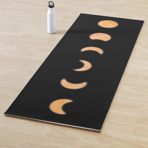 Modern black orange moons cycles on black yoga mat
