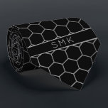 Modern Black Silv Foil Geometric Monogram Neck Tie<br><div class="desc">Modern Black with Faux Silver Foil Geometric Monogram Necktie in a stylish pattern of silver grey hexagons on an elegant black background. Easy to customize with text, fonts, and colors. Created by Zazzle pro designer BK Thompson © exclusively for Cedar and String; please contact us if you need assistance, have...</div>