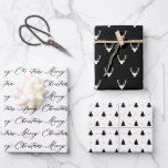 Modern Black & White Christmas Trees & Reindeer Wrapping Paper Sheets<br><div class="desc">Simple,  modern black and white gift wrapping paper sheets,  featuring the words "Merry Christmas" in an elegant handwritten script,  a pattern with reindeer heads with antlers,  and a pattern with Christmas trees and snowflakes.</div>