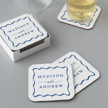 Modern Blue Wavy Frame Wedding Square Paper Coaster<br><div class="desc">Add a stylish touch to your wedding reception, rehearsal dinner, engagement party, or wedding shower with these Modern Blue Wavy Frame paper coasters. The retro wedding coasters display the couple's names in bold blue lettering surrounded by a blue wavy border contrasting with a white background. The trendy wedding coasters were...</div>