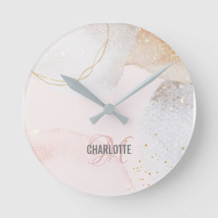 Modern blush pink abstract art monogram name round clock
