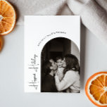 Modern Boho Arch Happiest Holidays Vertical Photo Holiday Card<br><div class="desc">Celebrate the joy of the season with this modern boho arch happiest holidays vertical photo holiday card. The unique and chic editable script creates a touch of charm and individuality. Its simple, elegant black-and-white design, featuring a classic bohemian arch frame, evokes a whimsical winter ambiance. The minimal and delicate festive...</div>