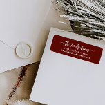 Modern Brick Red Script | Family Christmas Label<br><div class="desc">These modern and stylish holiday return address labels feature your family name in simple white script and text on a festive dark brick red background.</div>