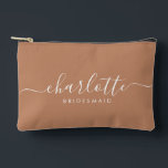 Modern Bridesmaid Gift Caramel Favor  Accessory Pouch<br><div class="desc">This Bridesmaid accessory bag features a handwritten white script typography with swashes on a caramel background. Present your bridesmaids with a toiletry bag for their makeup and small items traditionally presented at the rehearsal dinner,  for use in the early morning before the wedding.</div>