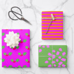 Modern Bright Green Orange Hot Pink Christmas Wrapping Paper Sheets<br><div class="desc">This set of three designs has green and red holly leaves on hot pink,  with a bright orange and pink stripe,  and a modern shape in pink and Kelly green.</div>