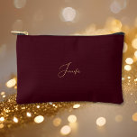 Modern Burgundy Gold Monogram Travel Cosmetic Golf Accessory Pouch<br><div class="desc">Create your own custom, personalized, beautiful modern elegant faux gold script / typography monogram monogrammed, durable Spun Polyester, mens womens burgundy maroon dark red zippered cosmetic makeup toiletry bag golf beach accessory pouch. Simply type in your name / initials / monogram, to customize. Make a great gift for birthday, fathers...</div>
