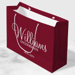 Modern Burgundy Red Personalized Groomsman Large Gift Bag<br><div class="desc">Personalized Groomsman Gifts
featuring personalized groomsman's name in white modern script font style with title and wedding date in modern sans serif font style on burgundy red background.

Also perfect for best man,  father of the bride,  bridesmaid,  maid of honor,  mother of the bride and more.</div>