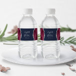 Modern Burgundy Silver Agate Navy Blue Wedding Water Bottle Label<br><div class="desc">This modern wedding design features a burgundy red watercolor agate and silver faux glitter border on the left and right sides. Personalize it with the couple's names in elegant silver gray handwriting script over a large ampersand on a navy blue background,  with the wedding date below.</div>