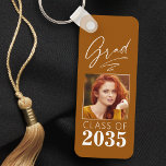 Modern Calligraphy Ink Script Grad Photo 2 Sided Keychain<br><div class="desc">A trendy, new two sided, sturdy aluminum, Graduate keychain - keyring with your photo on the front. All Personalized, featuring "Grad" in elegant calligraphy ink script with "Class of, The Year, School Name & Your Name" in modern typography. The graduate's photo is artfully accented with a delicate gradient boarder. The...</div>