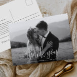 Modern Calligraphy Script Wedding Photo Thank You Postcard<br><div class="desc">This Modern Calligraphy Script Wedding Photo Thank You Postcard features your full wedding photo,  with calligraphy script overlay. Customize your special wedding thank you on the back,  or remove it to leave the back blank for your handwritten message of thanks.</div>