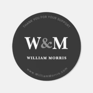 Modern Charcoal Black Serif Monogram Brand Logo Classic Round Sticker