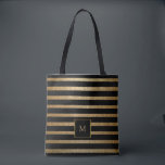 Modern chic black and gold stripes monogrammed tote bag<br><div class="desc">Modern black and gold stripes printed all over tote bag.
You can personalize it and add your own monogram.</div>