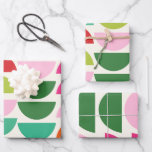 Modern Christmas Colorful Geometric Shapes Wrapping Paper Sheets<br><div class="desc">This stylish holiday wrapping paper features a contemporary composition of geometric shapes in a modern Christmas color palette of bright green,  red,  and pink. Great gift idea.</div>