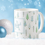 Modern Christmas Forest Trees Blue Green Monogram Coffee Mug<br><div class="desc">Create a Christmas holiday season themed mug personalized with a monogram and handwritten script name featuring a pattern of modern, hand drawn abstract Christmas trees and forest trees in winter snow in blue and green. Contact the designer via Zazzle Chat or makeitaboutyoustore@gmail.com if you'd like this design modified or on...</div>
