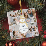 Modern Christmas Snowman Monogram Four Photo Ceramic Ornament<br><div class="desc">Celebrate the magical and festive holiday season with our custom holiday photo ornaments. Our modern elegant holiday design features a modern and minimalistic four photo holiday collage grid layout with a modern white & faux gold snowman design placed in the centre of the four photo holiday photo layout. Customized with...</div>