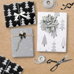 Modern Christmas Trees Black Silver Gray Pattern Wrapping Paper Sheets<br><div class="desc">A collection of coordinated giftwrap sheets featuring modern abstract Christmas and forest trees and winter snow patterns in colors of silver, gray, black and white. Contact the designer BEFORE ORDERING via Zazzle Chat or makeitaboutyoustore@gmail.com for design modifications, assistance with personalizing or transferring the design to another product or would like...</div>