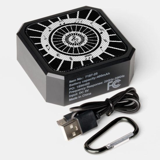 Modern circular black white musical notes design bluetooth speaker