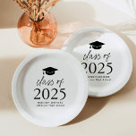 Modern Class of 2025 Black Script Graduation Paper Plates<br><div class="desc">Add a personalized touch to your graduation party with these modern graduation paper plates! The paper plates feature a black graduation cap at the top of the design with "Class of 2025" displayed in bold black lettering. Personalize the black and white graduation plates with the graduate's name, school, and graduation...</div>